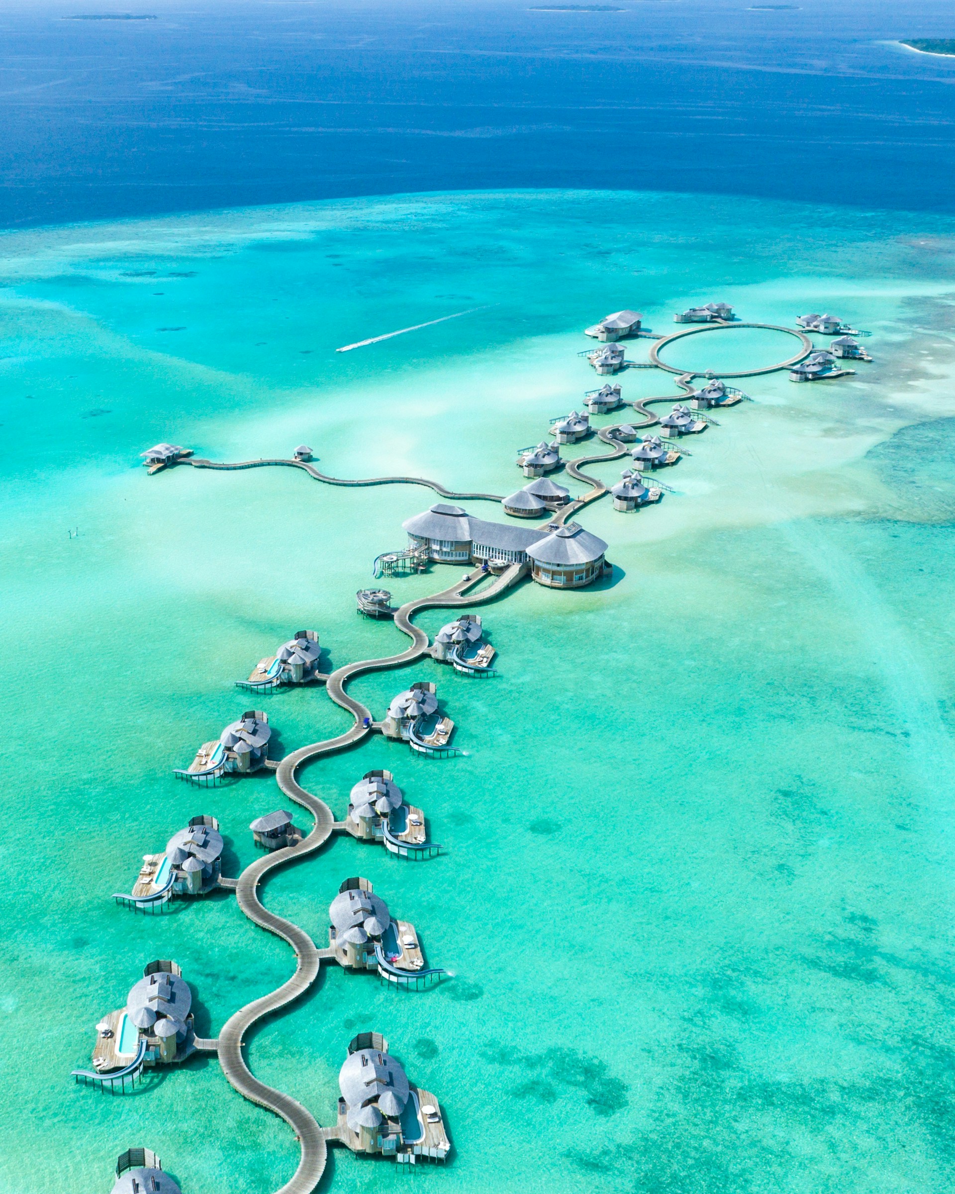 Turquoise shallows surrounding a Maldives island resort